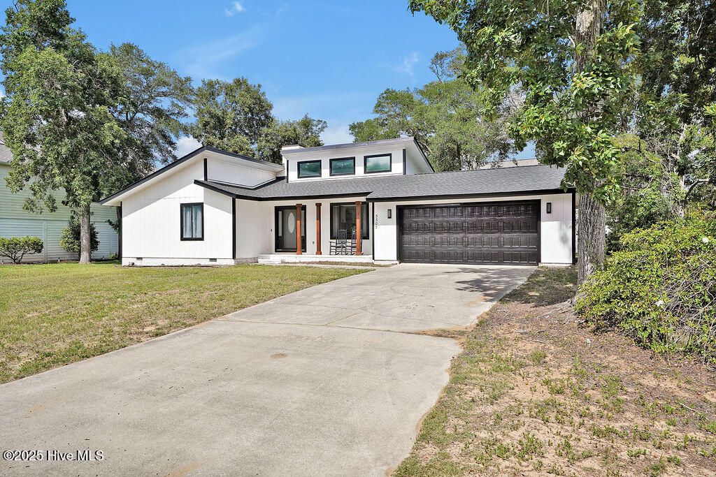 Photo of 3307 E Oak Island Drive, Oak Island, NC 28465 (MLS # 100570405)