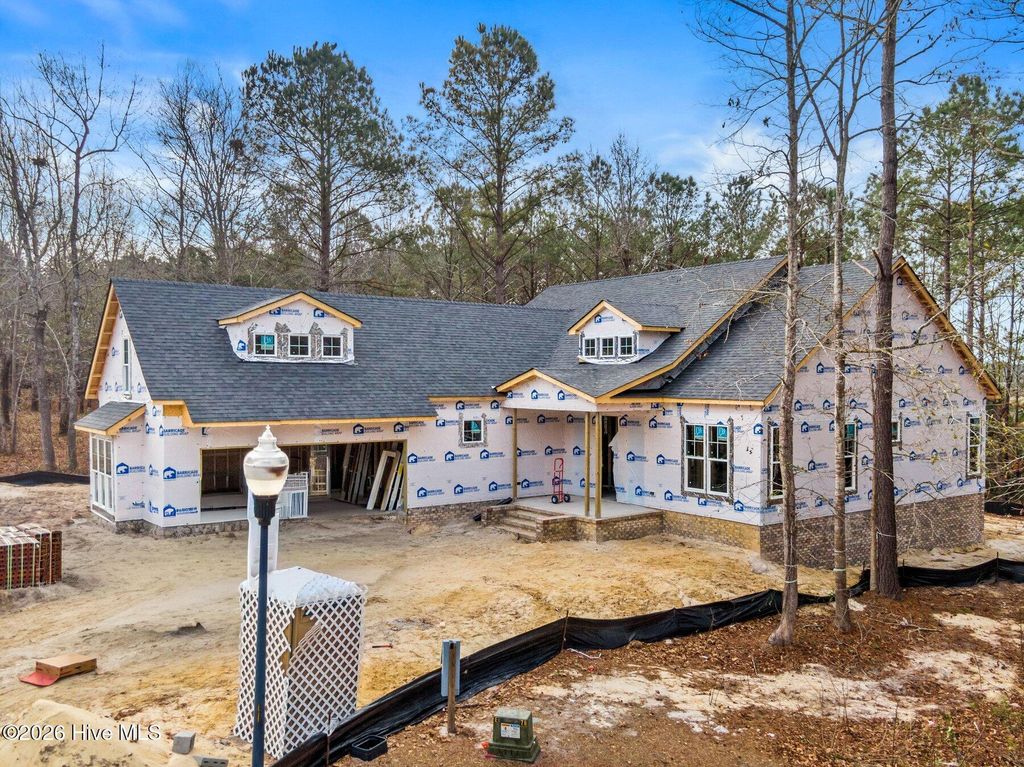 Photo of 726 Cedarhurst Drive SE, Bolivia, NC 28422 (MLS # 100554434)