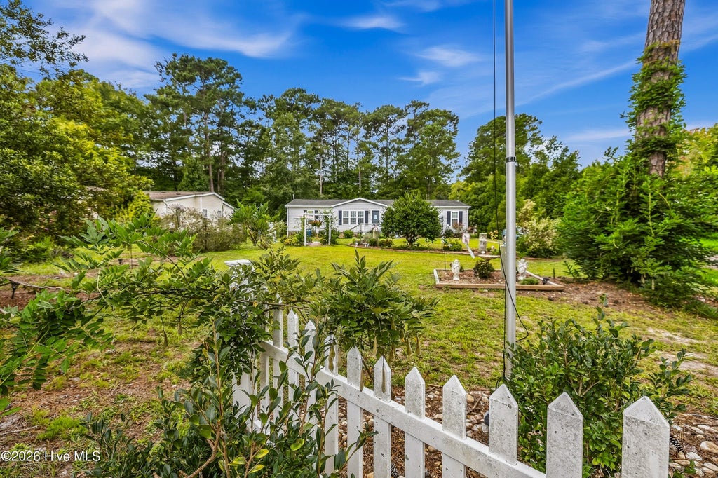 Photo of 319 Beachwood Drive NW, Calabash, NC 28467 (MLS # 100603242)