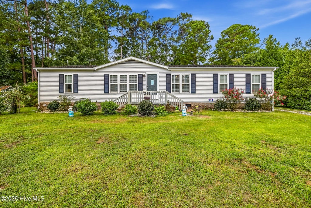 Photo of 319 Beachwood Drive NW, Calabash, NC 28467 (MLS # 100603242)