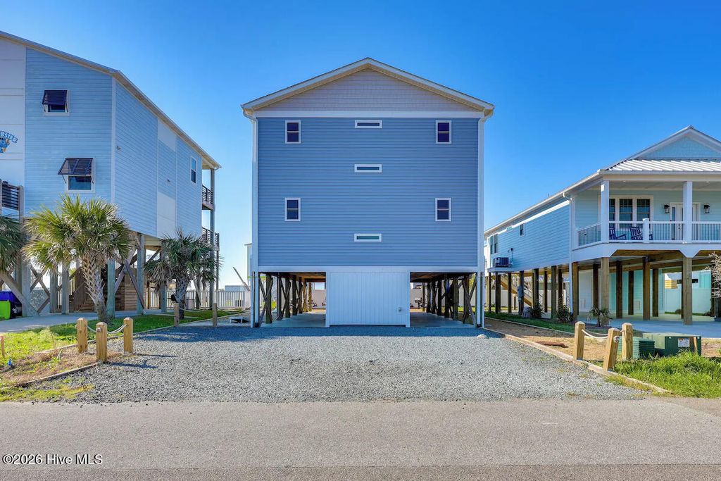 Photo of 5205 E Pelican Drive, Oak Island, NC 28465 (MLS # 100577367)