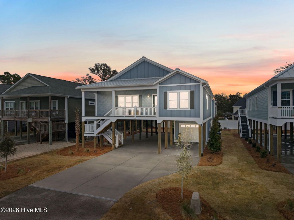 Photo of 310 NE 58th Street, Oak Island, NC 28465 (MLS # 100558448)