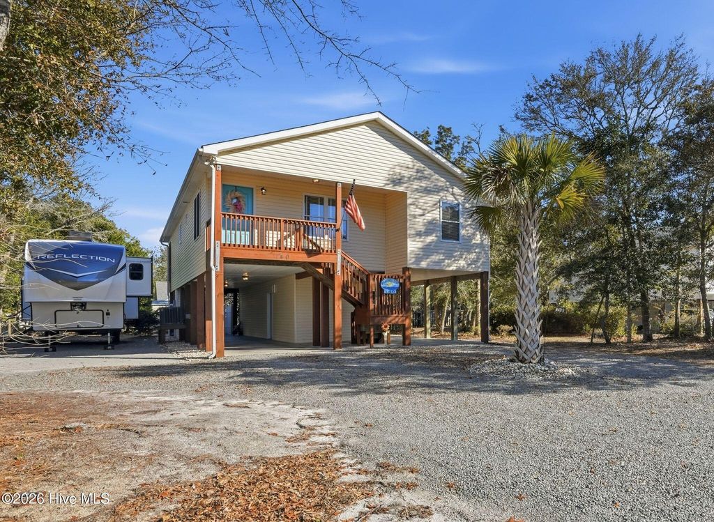 Photo of 140 NE 18th Street, Oak Island, NC 28465 (MLS # 100555111)