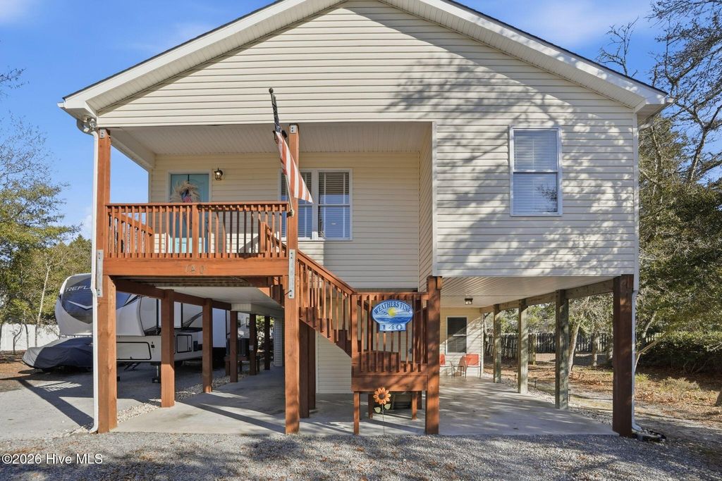 Photo of 140 NE 18th Street, Oak Island, NC 28465 (MLS # 100555111)