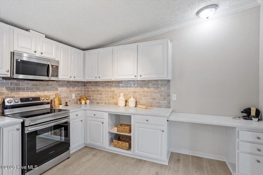 Photo of 6922 Great Swamp Loop, Lucama, NC 27851 (MLS # 100547312)