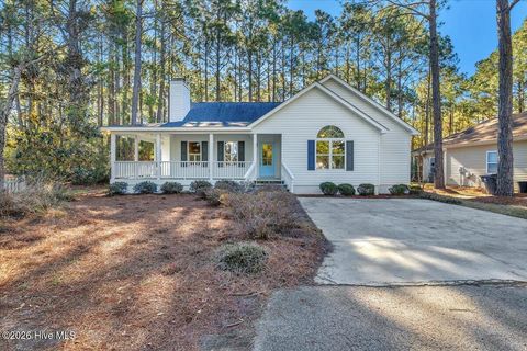 Photo of 4071 Country Garden Lane, Southport, NC 28461 (MLS # 100556413)