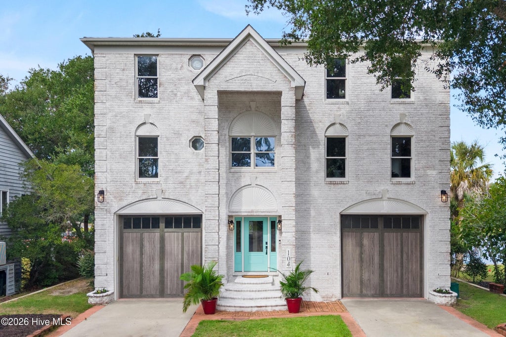 Photo of 104 SW Yacht Drive, Oak Island, NC 28465 (MLS # 100609281)