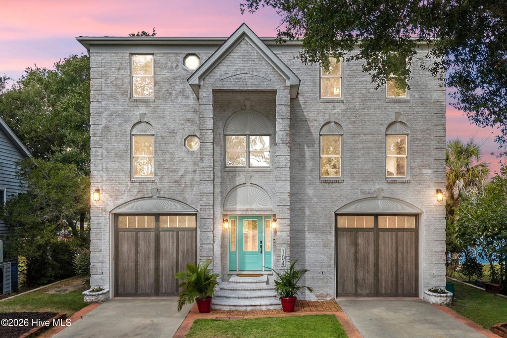 Photo of 104 SW Yacht Drive, Oak Island, NC 28465 (MLS # 100609281)