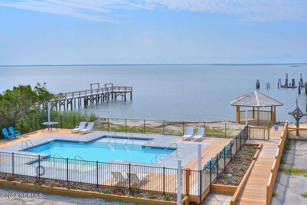 Photo of 704 E Moore Street # 110, Southport, NC 28461 (MLS # 100549842)