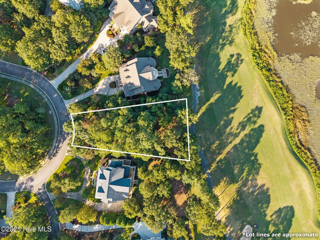Photo of 2138 Arnold Palmer Drive, Shallotte, NC 28470 (MLS # 100530249)