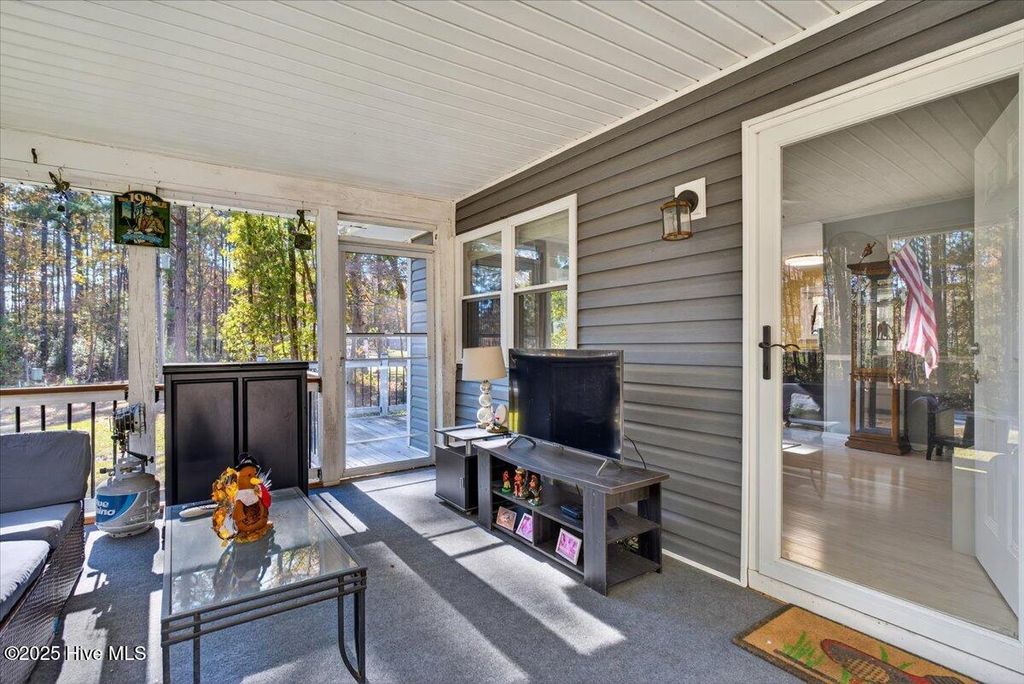 Photo of 407 Sandlewood Drive NW, Calabash, NC 28467 (MLS # 100542492)