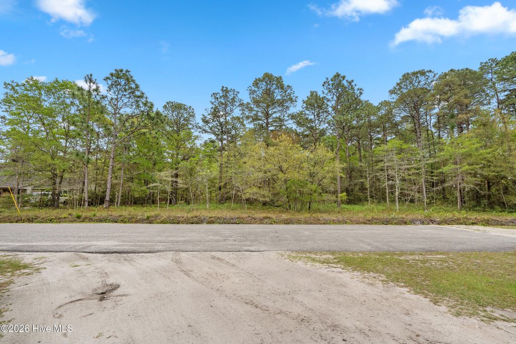 Photo of 3 Deer Run Road SW, Carolina Shores, NC 28467 (MLS # 100569664)