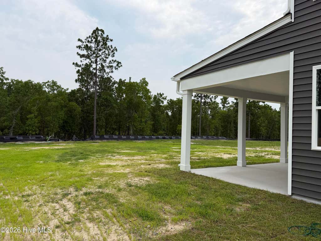 Photo of 937 Peckham Lp Loop, Aberdeen, NC 28315 (MLS # 100593133)