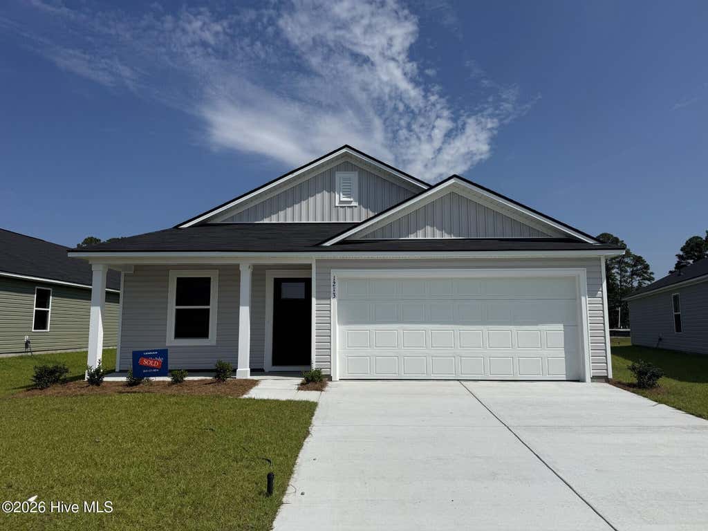 Photo of 1106 Cooper Hawk Lane SW, Ocean Isle Beach, NC 28469 (MLS # 100585363)