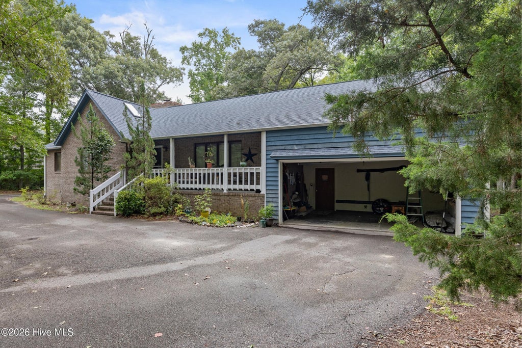 Photo of 528 Pinehurst Circle, Hampstead, NC 28443 (MLS # 100585704)