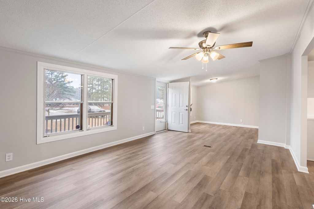 Photo of 235 Meadowfield Circle, Aberdeen, NC 28315 (MLS # 100552970)