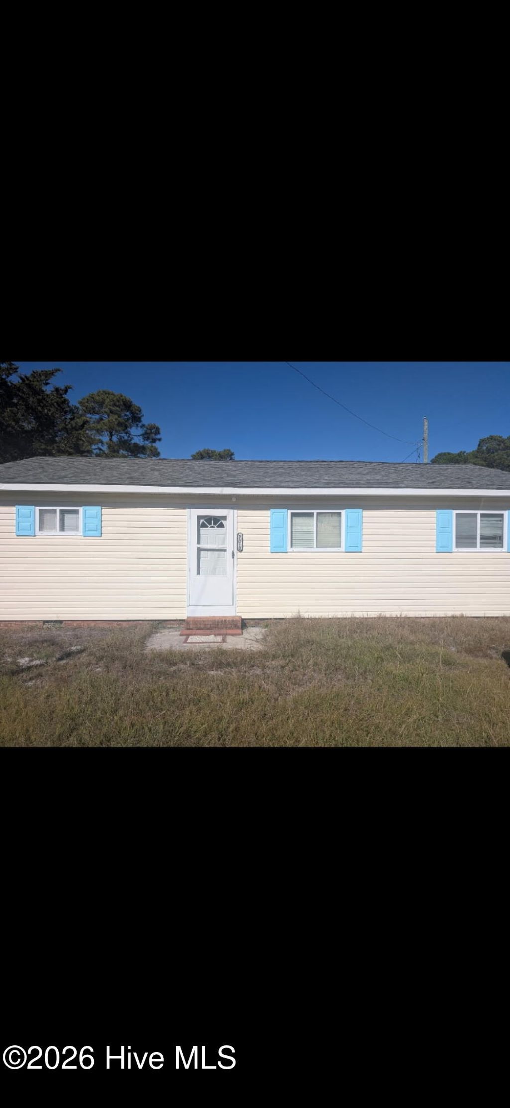 Photo of 7018 Beach Drive SW, Ocean Isle Beach, NC 28469 (MLS # 100553079)