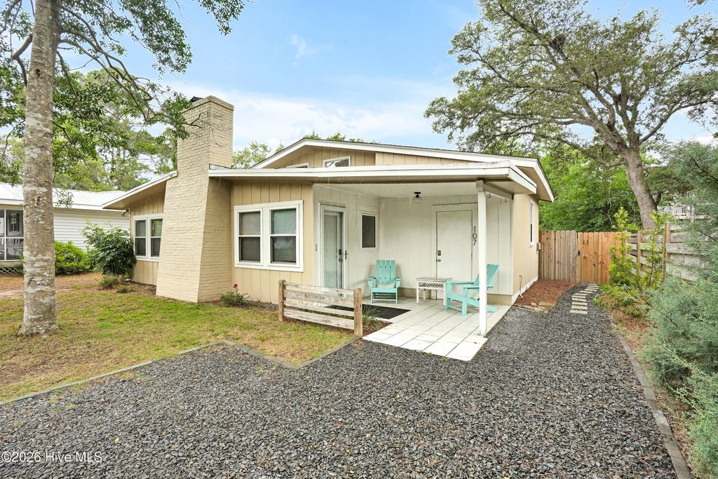 Photo of 107 NE 78th Street, Oak Island, NC 28465 (MLS # 100574490)