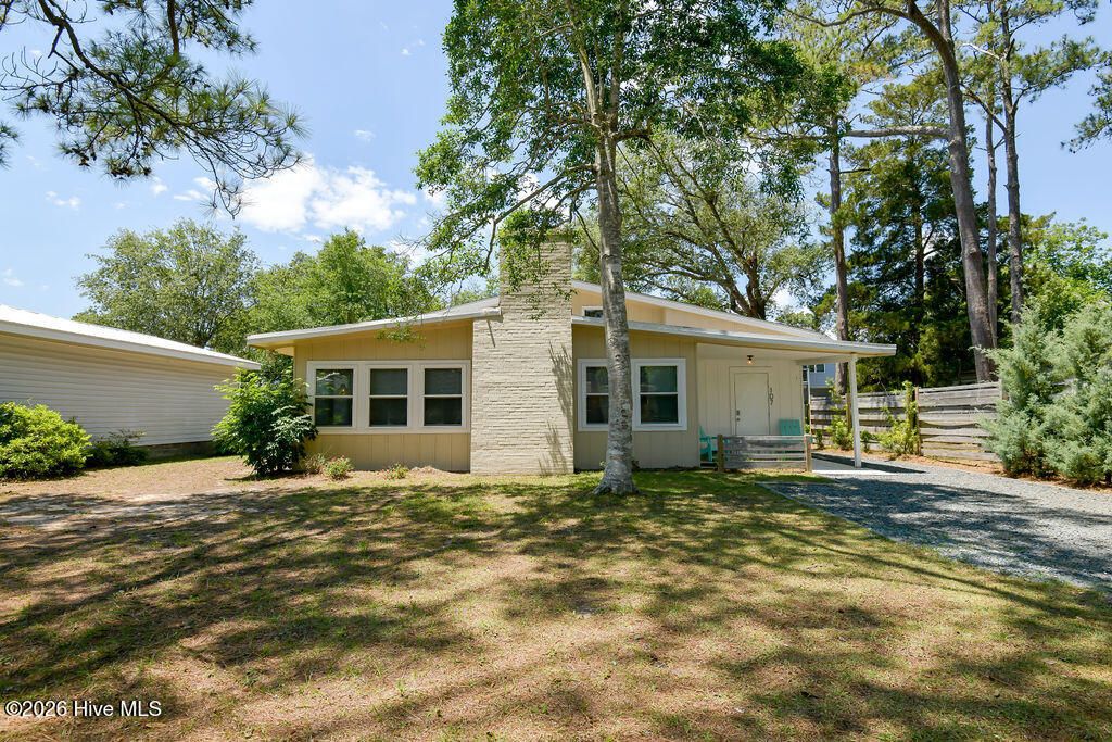 Photo of 107 NE 78th Street, Oak Island, NC 28465 (MLS # 100574490)