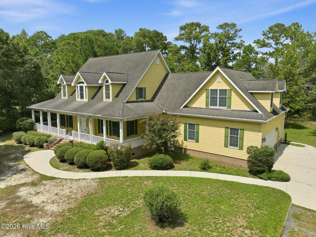 Photo of 303 Creekview Drive, Hampstead, NC 28443 (MLS # 100592676)