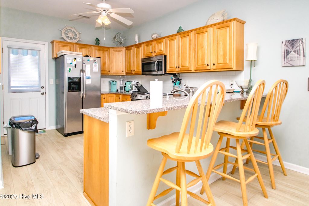 Photo of 1131 S Shore Drive, Surf City, NC 28445 (MLS # 100552425)