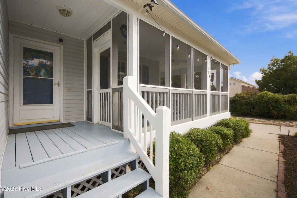 Photo of 408 Barbee Boulevard, Oak Island, NC 28465 (MLS # 100607618)