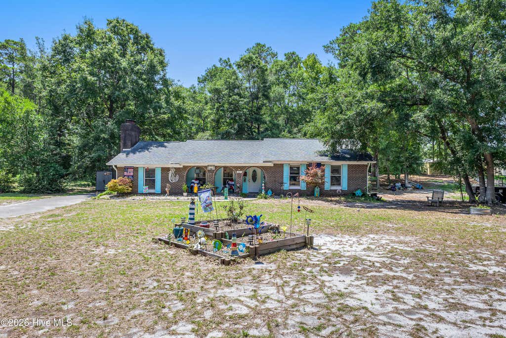 Photo of 307 Yaupon Drive, Southport, NC 28461 (MLS # 100595010)