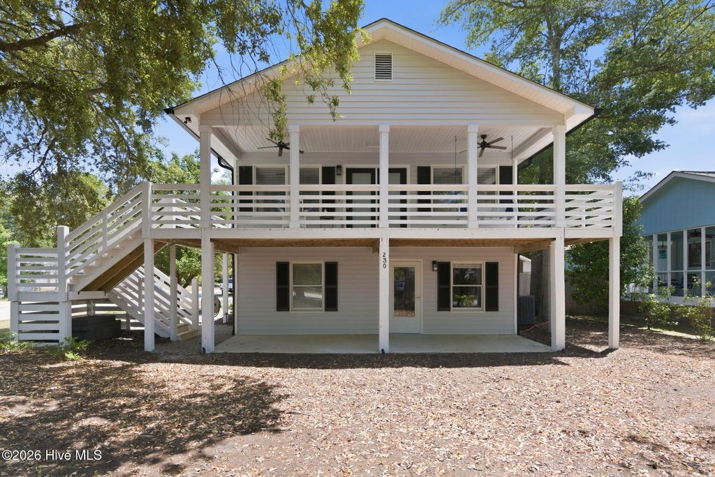 Photo of 230 NE 45th Street, Oak Island, NC 28465 (MLS # 100576309)