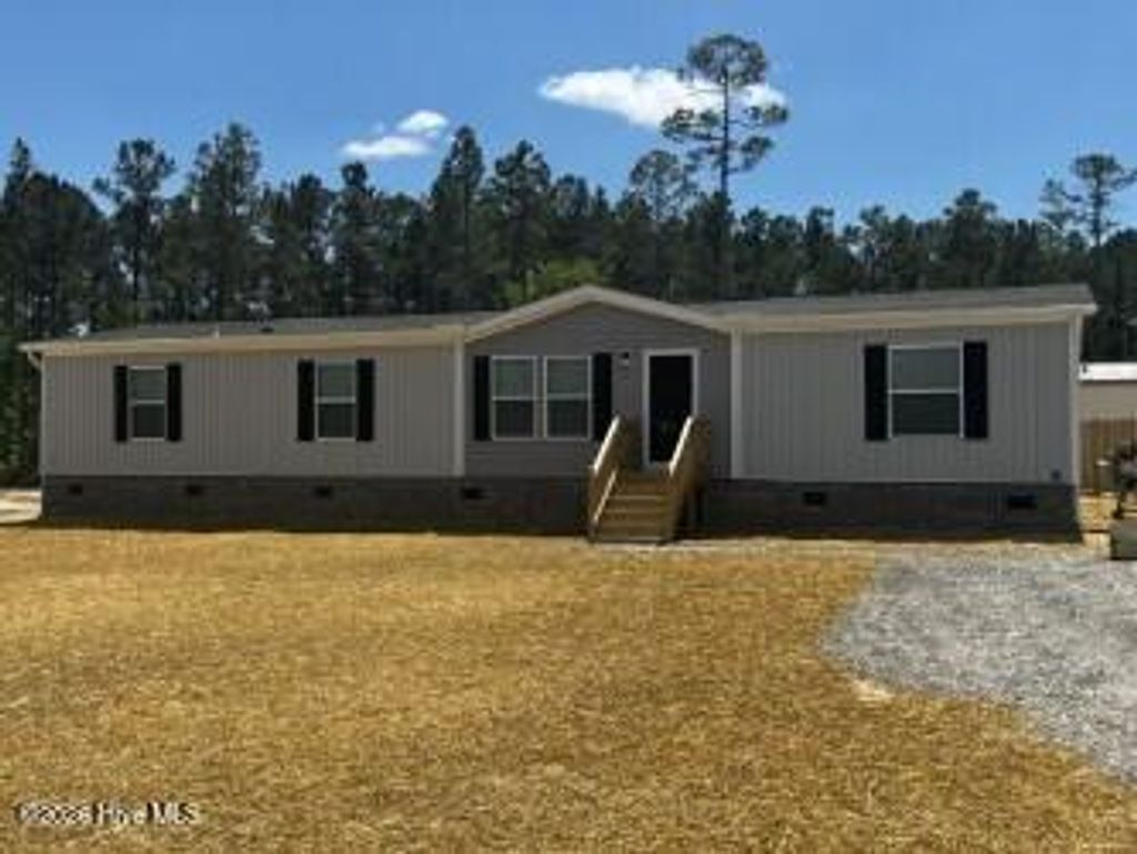 Photo of 8865 Millers Path NE, Leland, NC 28451 (MLS # 100577145)