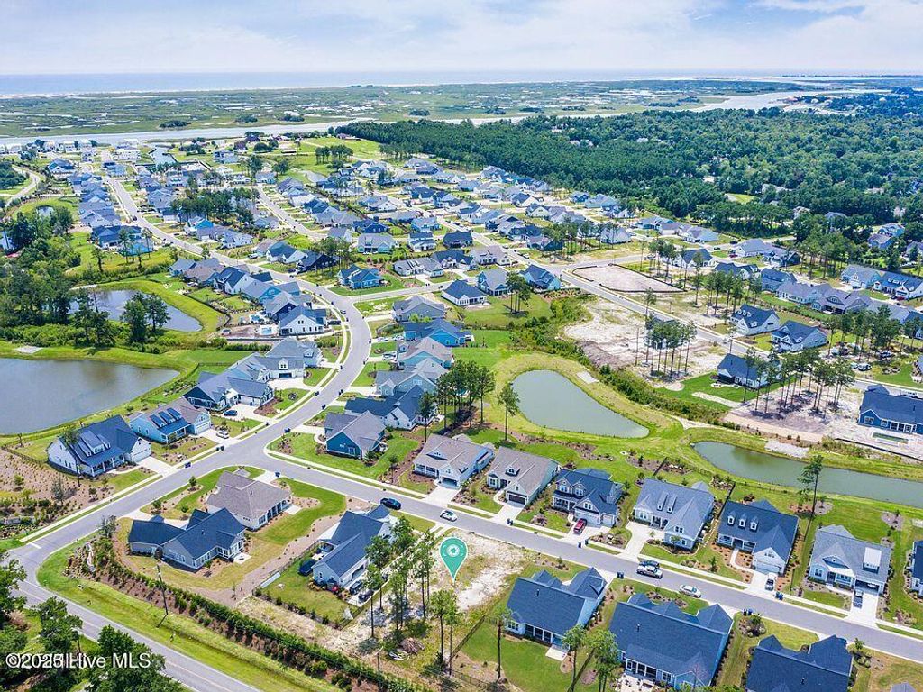 Photo of 60 Bluenose Lane, Hampstead, NC 28443 (MLS # 100526859)