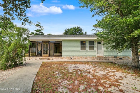 Photo of 303 Keziah Street, Oak Island, NC 28465 (MLS # 100590269)
