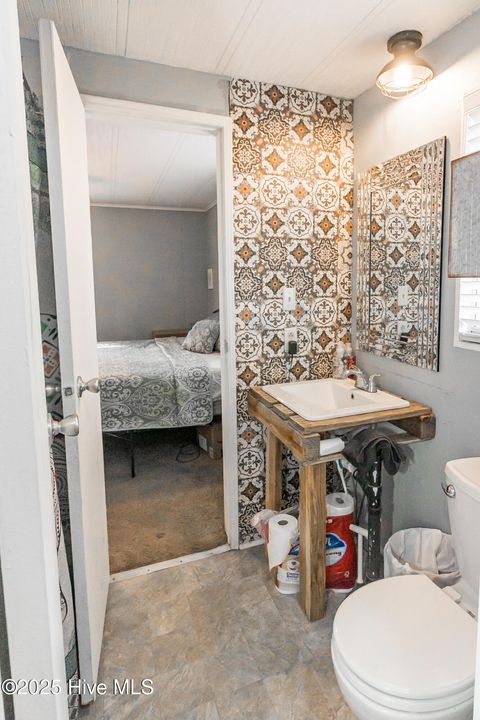 Tiny photo for 312 Peanut Road, Hampstead, NC 28443 (MLS # 100545695)