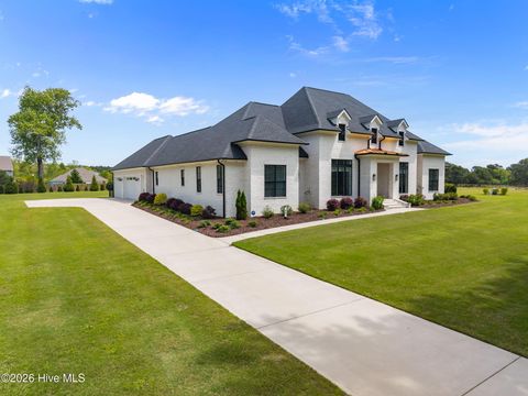 Photo of 47 E Rolling Meadows Road, Hampstead, NC 28443 (MLS # 100566934)