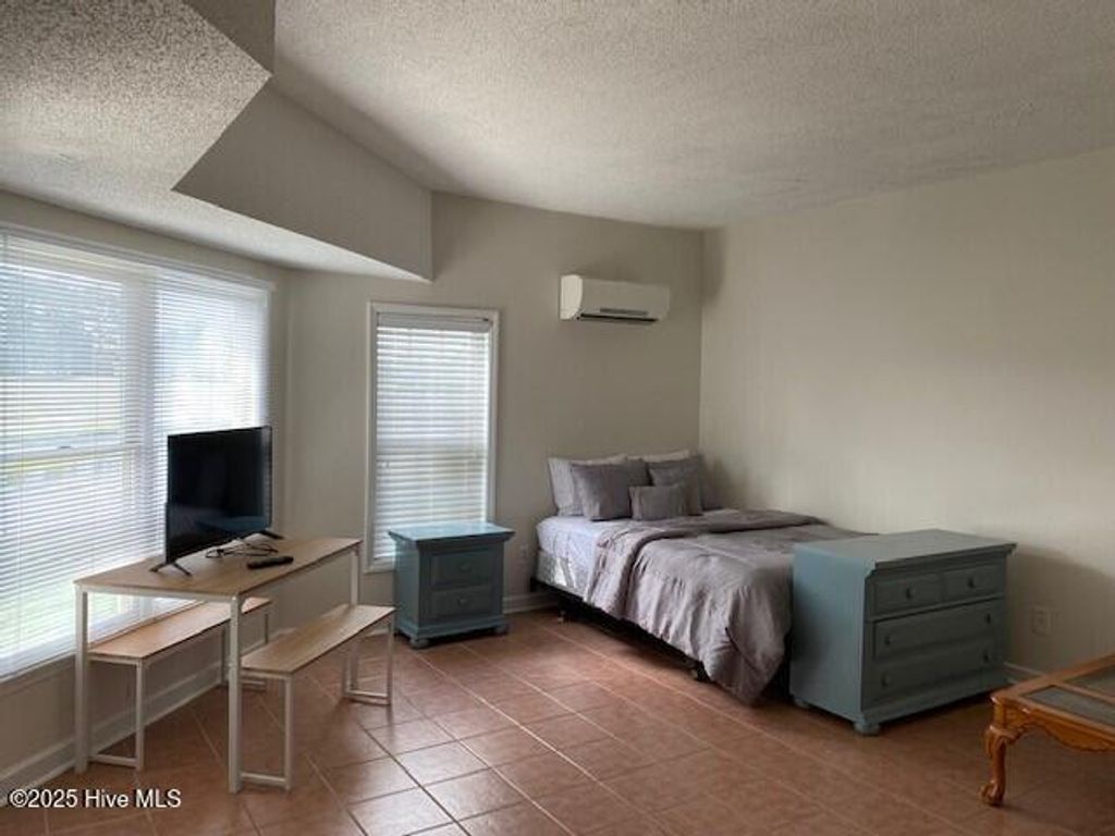 Photo of 3127 Lakeside Commons Drive SE # 1, Southport, NC 28461 (MLS # 100545126)