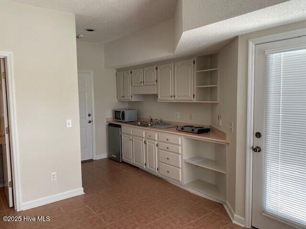 Photo of 3127 Lakeside Commons Drive SE # 1, Southport, NC 28461 (MLS # 100545126)