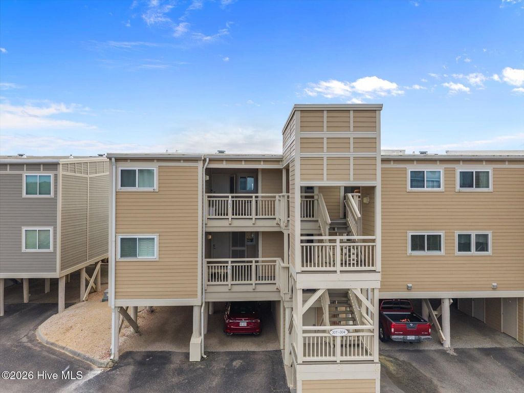 Photo of 1000 Caswell Beach Road #302, Oak Island, NC 28465 (MLS # 100564383)