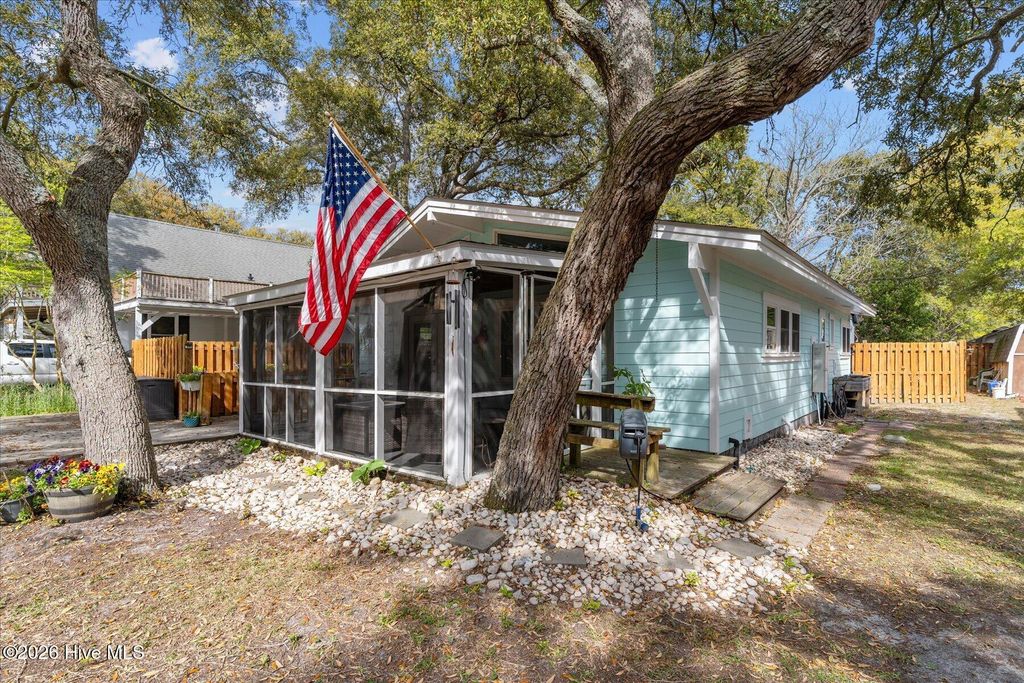 Photo of 104 SE 5th Street, Oak Island, NC 28465 (MLS # 100572004)