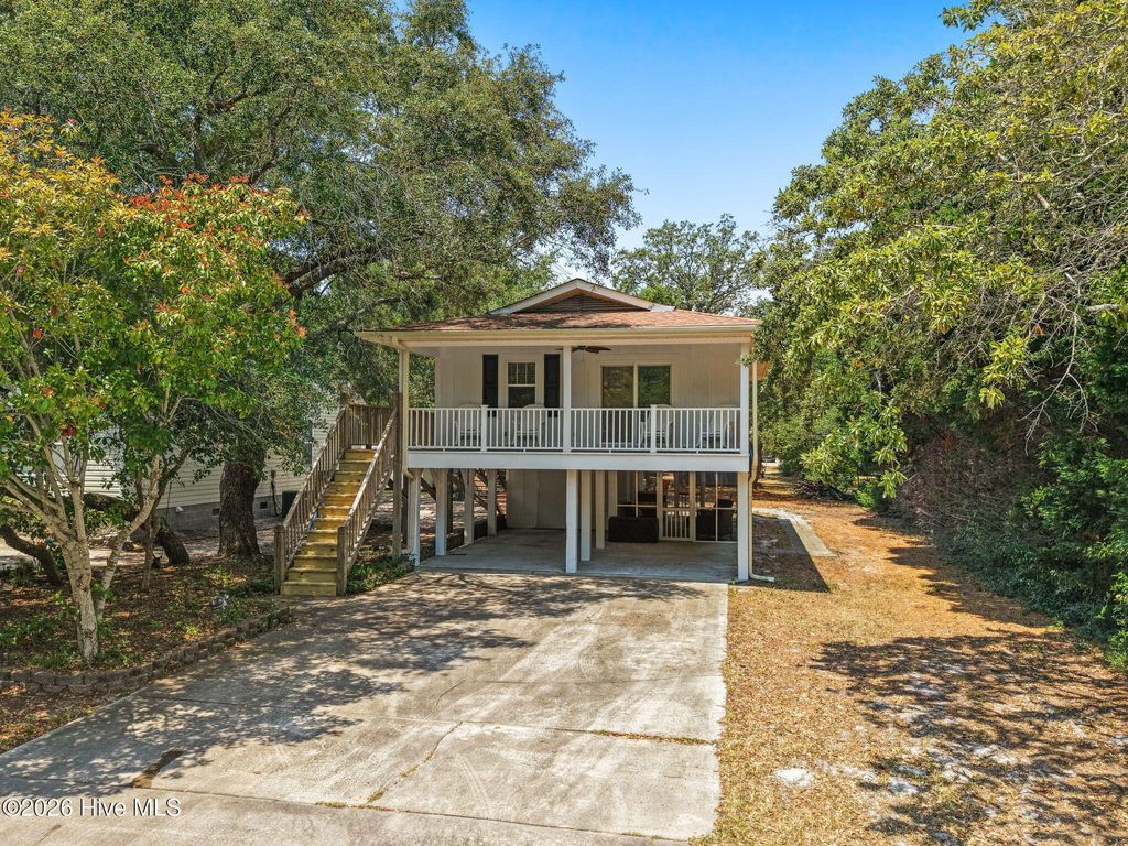 Photo of 169 NW 3rd Street, Oak Island, NC 28465 (MLS # 100580591)