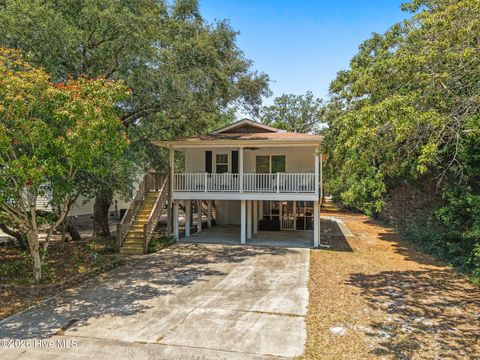 Photo of 169 NW 3rd Street, Oak Island, NC 28465 (MLS # 100580591)