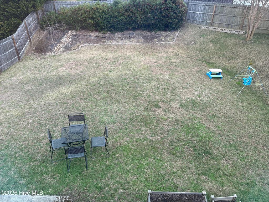 Photo of 225 Graphite Drive, Gibsonville, NC 27249 (MLS # 100557800)