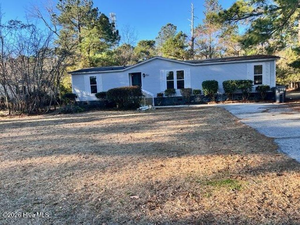 Photo of 158 Champion Drive, Hampstead, NC 28443 (MLS # 100556266)