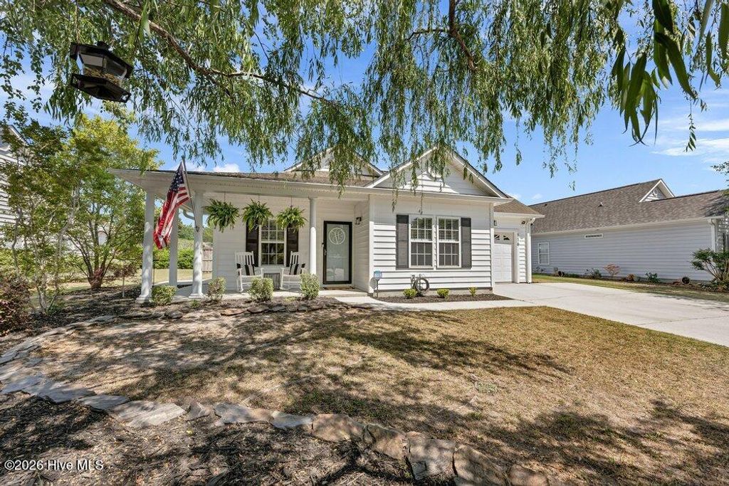 Photo of 116 N Palm Drive, Winnabow, NC 28479 (MLS # 100568146)