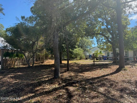 Photo of 54 NW 3rd Street, Oak Island, NC 28465 (MLS # 100612644)