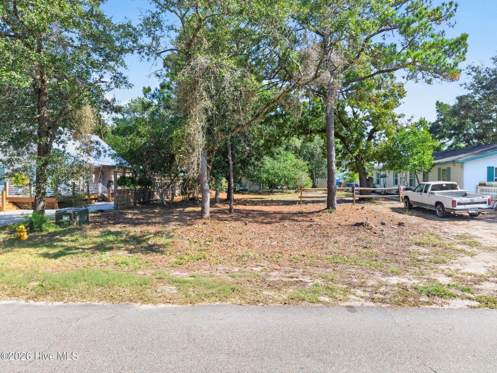 Photo of 54 NW 3rd Street, Oak Island, NC 28465 (MLS # 100612644)