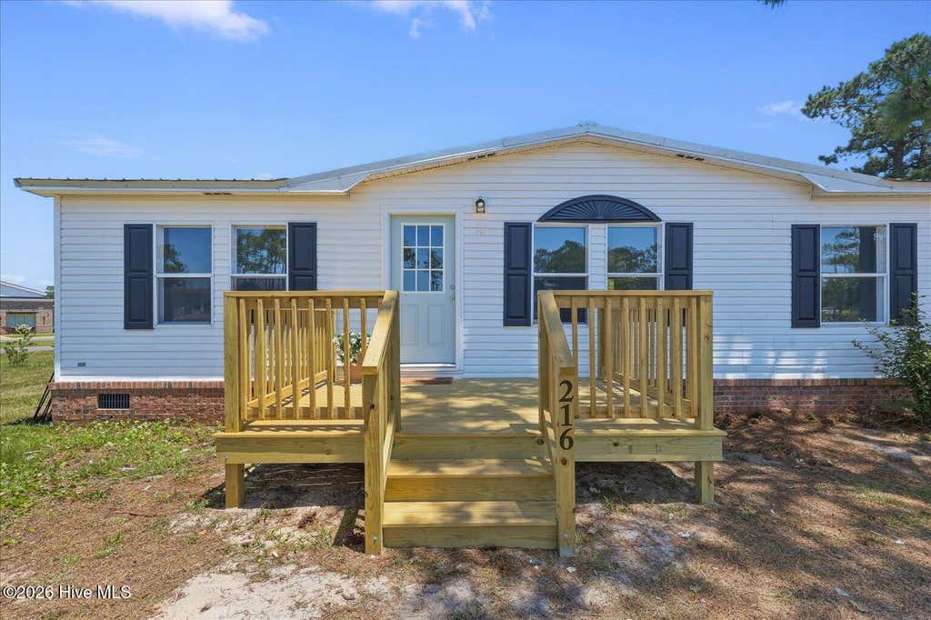 Photo of 216 Oak Grove Drive, Hampstead, NC 28443 (MLS # 100586006)