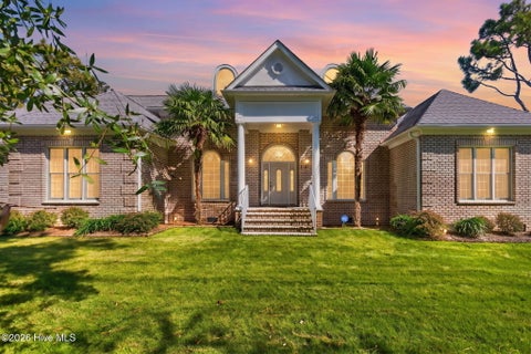 Photo of 699 Country Club Drive, Oak Island, NC 28465 (MLS # 100610337)
