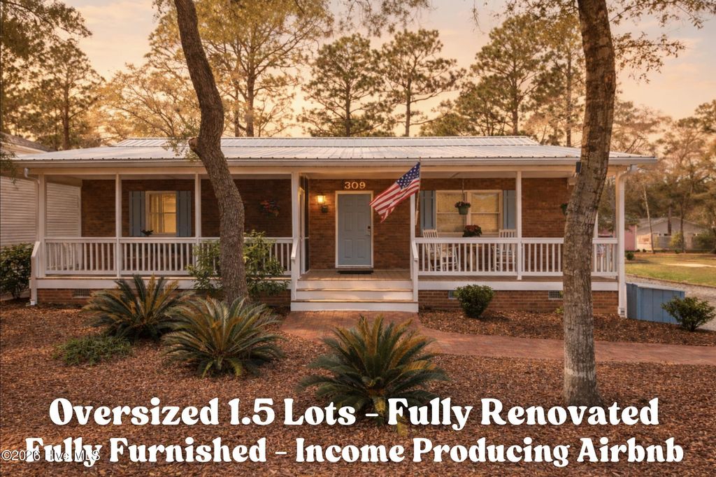 Photo of 309 NE 41st Street, Oak Island, NC 28465 (MLS # 100562646)