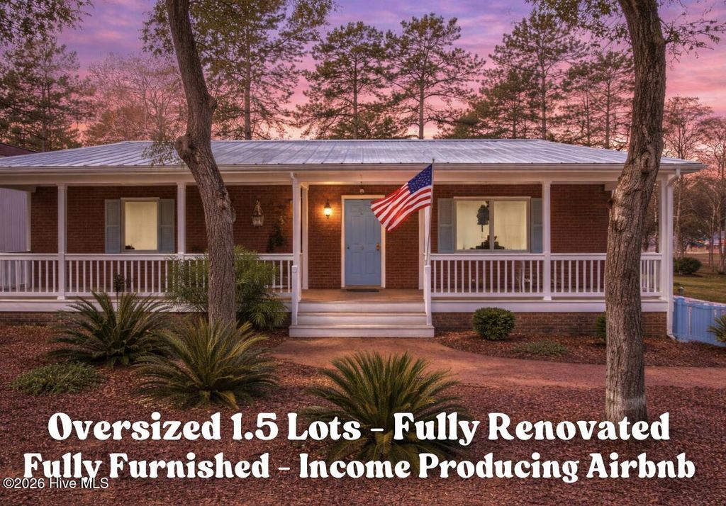 Photo of 309 NE 41st Street, Oak Island, NC 28465 (MLS # 100562646)