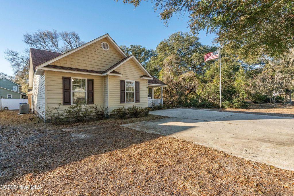 Photo of 803 W Oak Island Drive, Oak Island, NC 28465 (MLS # 100546792)