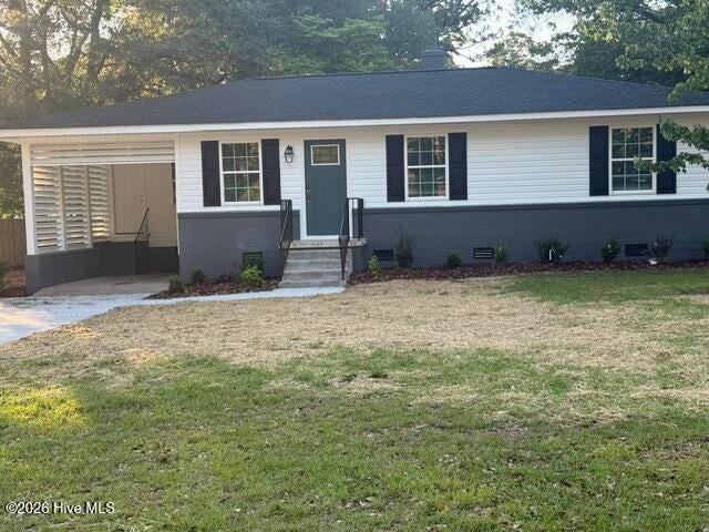 Photo of 402 Locust Street, Hamlet, NC 28345 (MLS # 100579339)